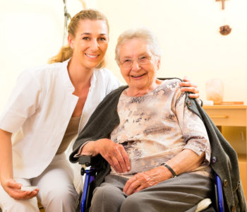 young woman and an elder woman smiling